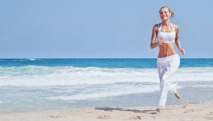 Woman running in beachside