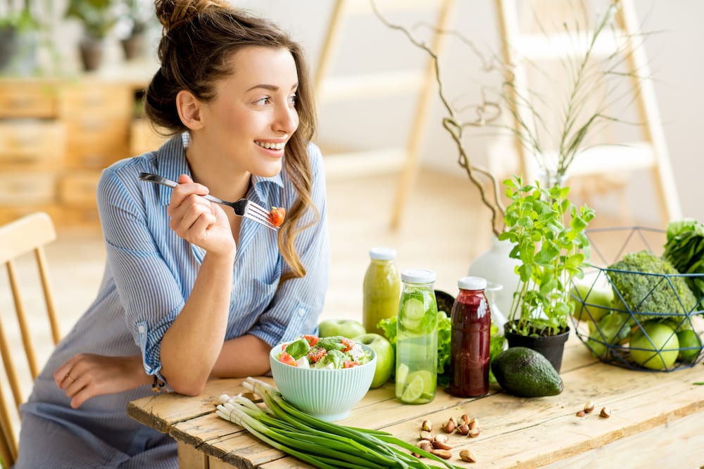 Woman eating veggies