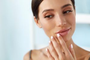 woman with dissolved lips after lip filler