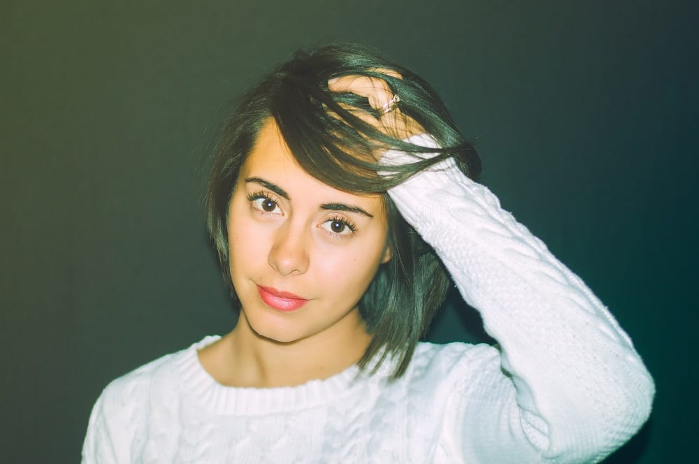 Woman fixing her hair