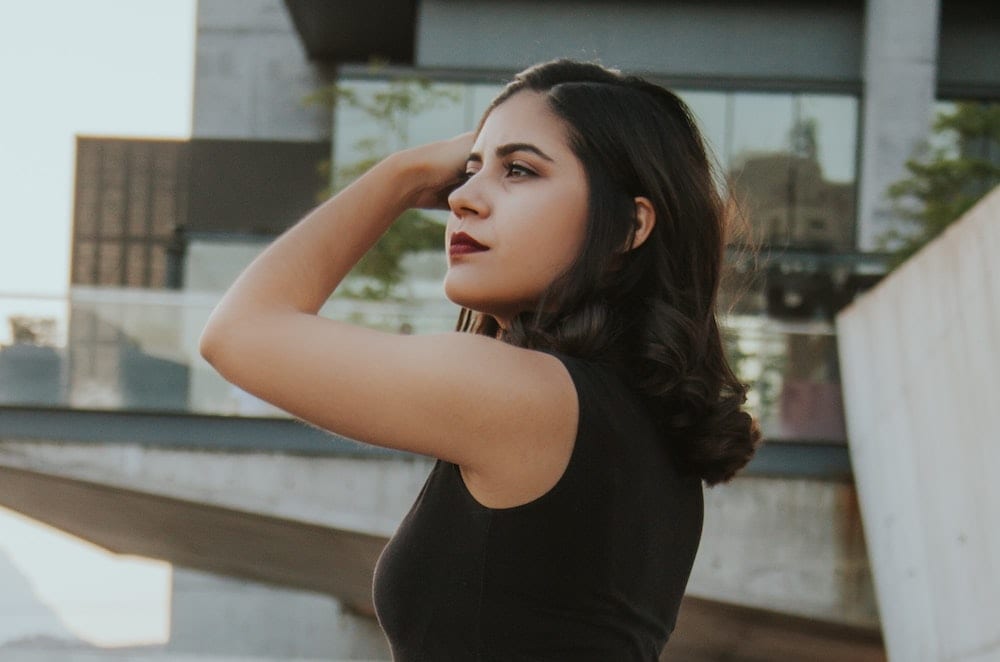 Woman fixing her hair