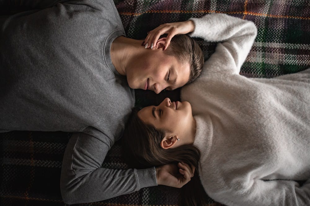Couple laying on the bed