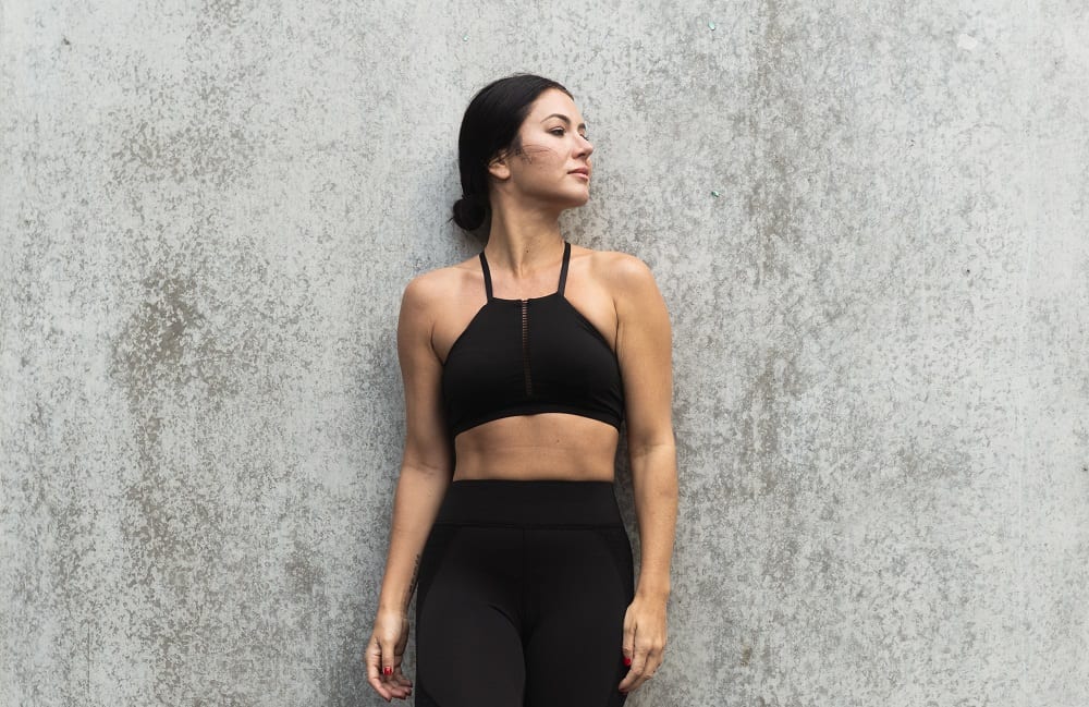 Woman leaning on wall